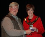 Councillor Noreen McCelland presents Edwin Bailey LIPF with his winning medal